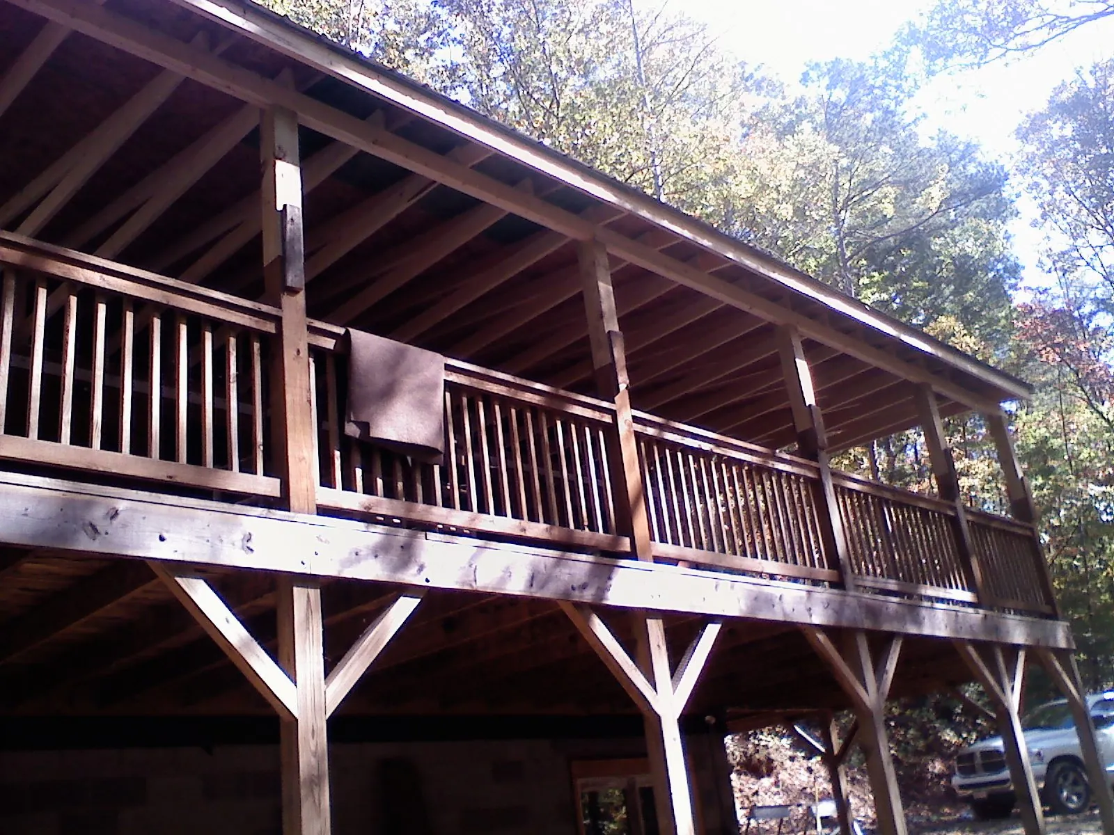 Timber framing under a new elevated porch and deck — Roof Leak Repair in Bellefonte by Roofing Brothers